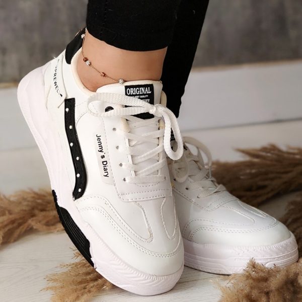 کتونی لژ دار سفید مشکی - مانتو پاتریس رشت