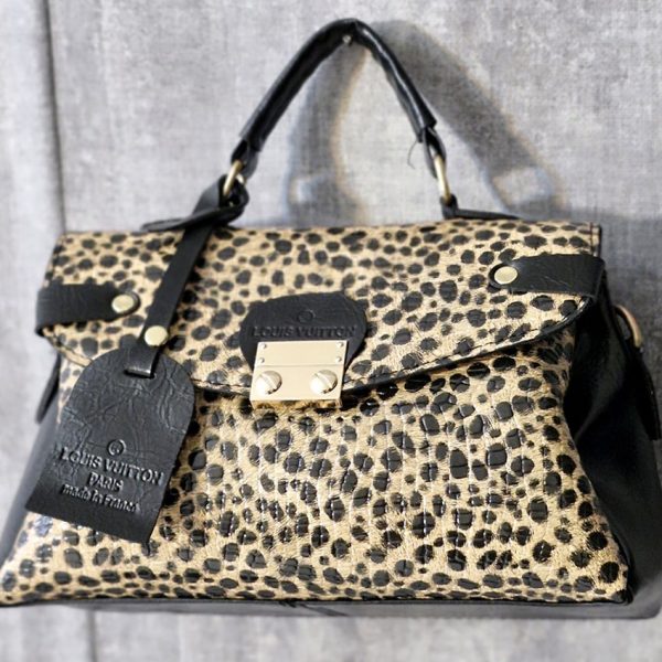 38000433-4-min کیف صندوقی پوست ماری - مانتو پاتریس رشت