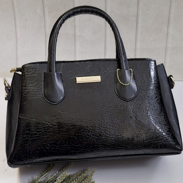 کیف مشکی زیپ طلایی - مانتو پاتریس رشت