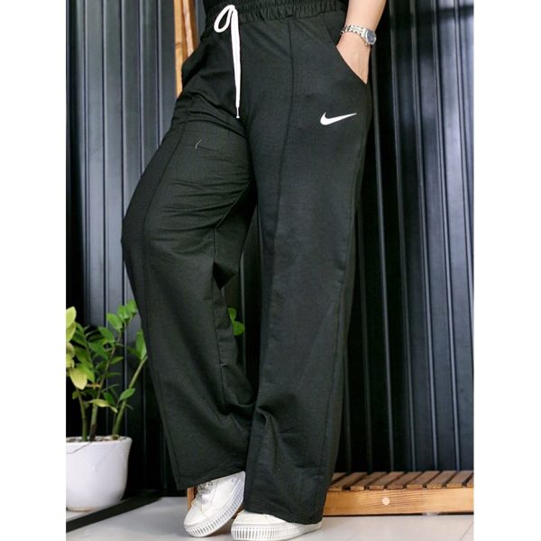 30200288-1-min شلوار بگ مشکی نایک - مانتو پاتریس رشت